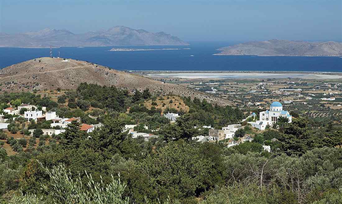 The white houses and blue-domed church of Zia on the slopes of Mount Dikeos above the north coast of Kos, a stop on a Kos bus tour.