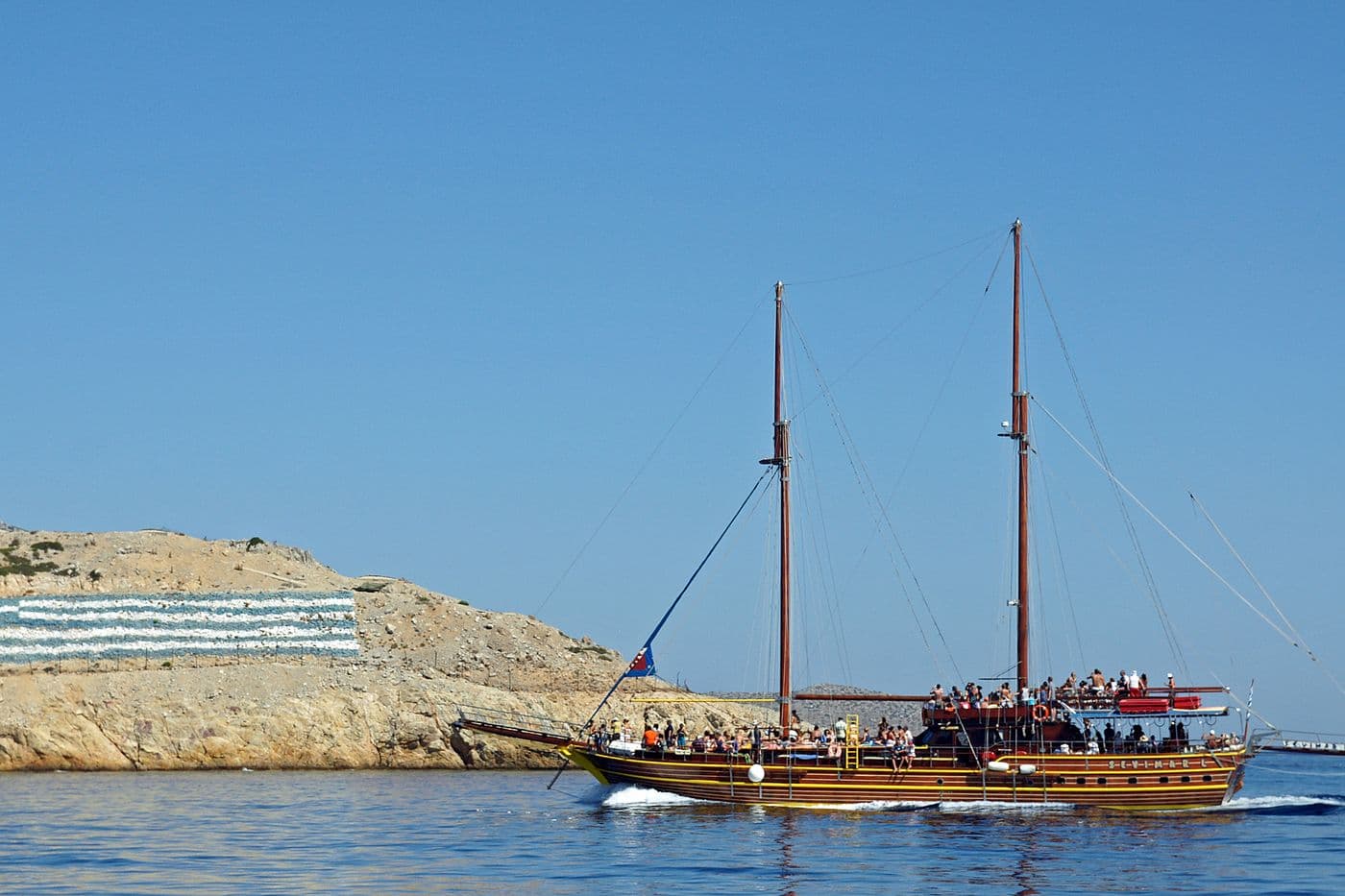 Kos pirate cruise ship sailing past Pserimos