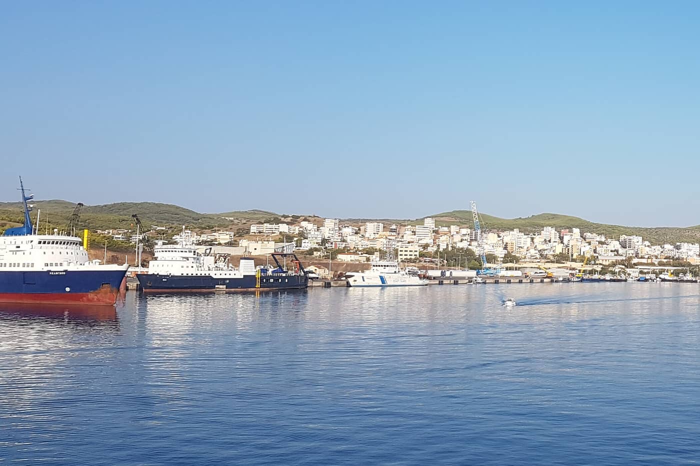 Ferries and the town of Lavrio seen from the sea, the port where Lavrio port transfers meet passengers