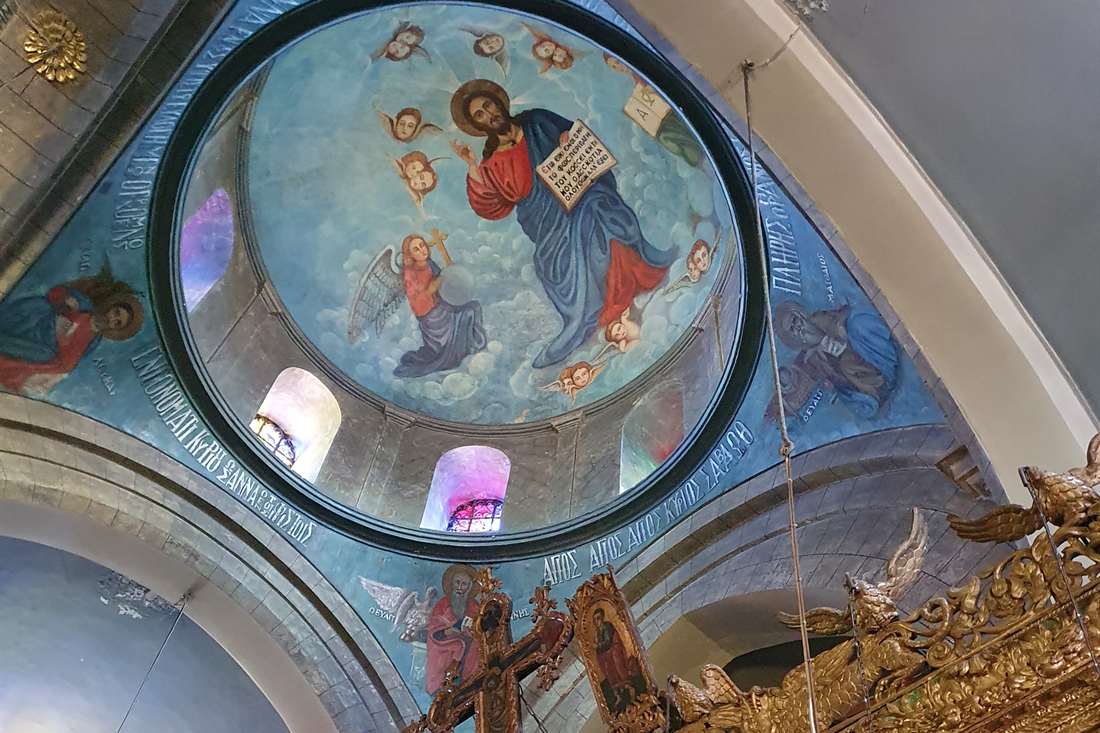 Painted dome with Christ and angels above the gilded iconostasis inside the Timios Stavros church in Pano Lefkara