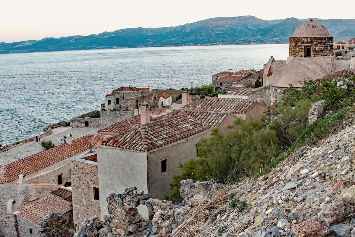 Monemvasia tours in the lower town with its stone houses and church domes above the sea