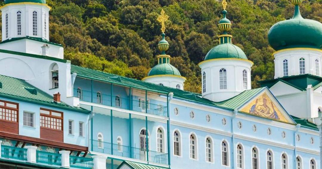 The green domes and pale walls of the Russian monastery of Saint Panteleimon on the west coast of Mount Athos.