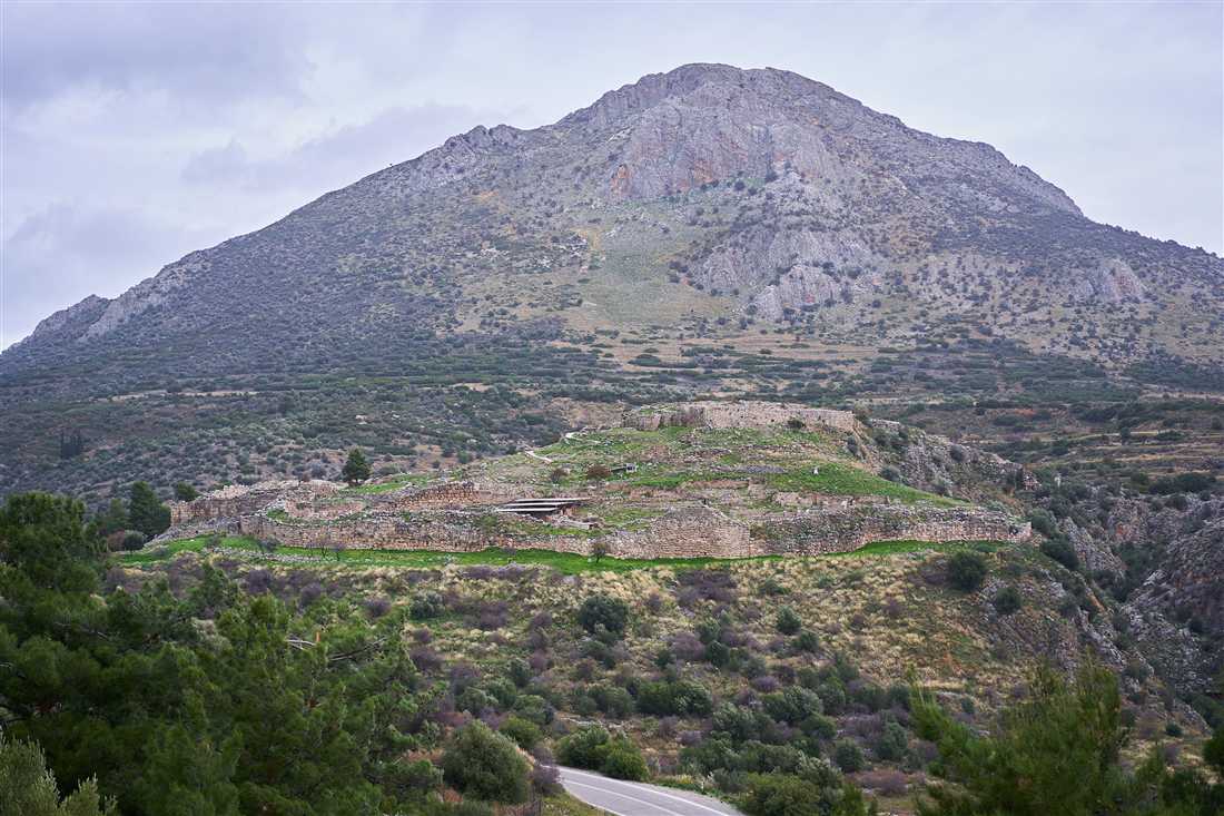 The hill of the citadel of Mycenae below Mount Profitis Ilias, seen from the Treasury of Atreus on a Mycenae private tour.