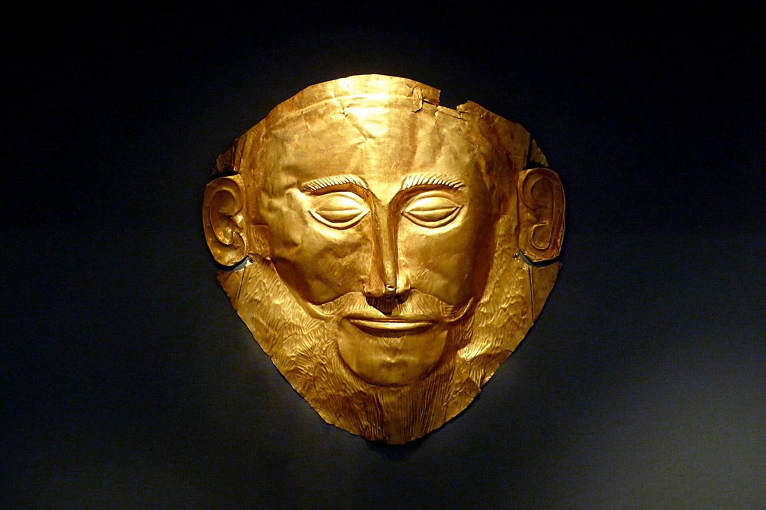 The gold Mask of Agamemnon from Mycenae in its case at the National Archaeological Museum in Athens, a highlight on a tour with National Archaeological Museum tickets.