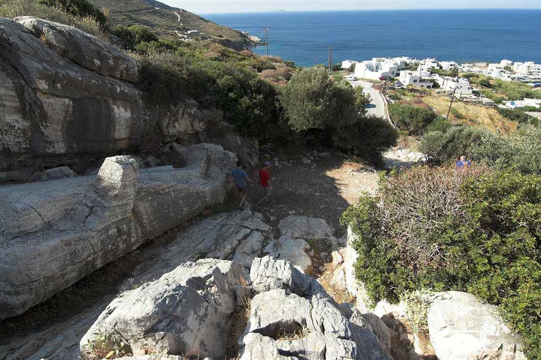 The unfinished giant kouros lying in its ancient marble quarry above the village of Apollonas, a stop on a Naxos bus tour.