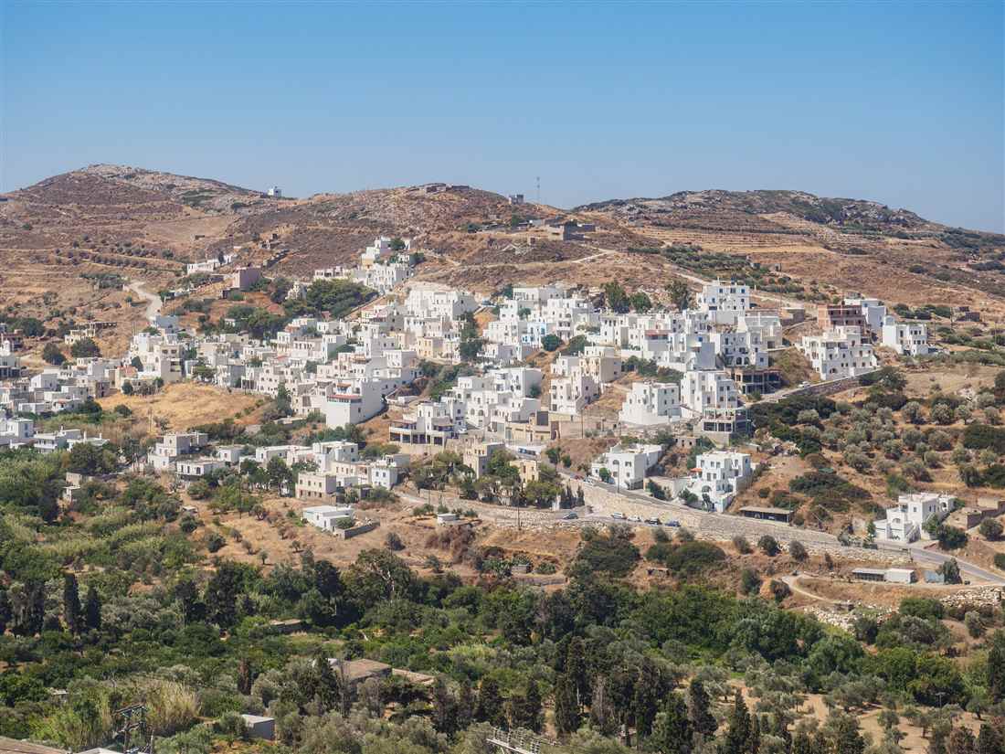 The village of Melanes among fields and olive groves in the hills of Naxos, where a Naxos farm tour visits a family farm.