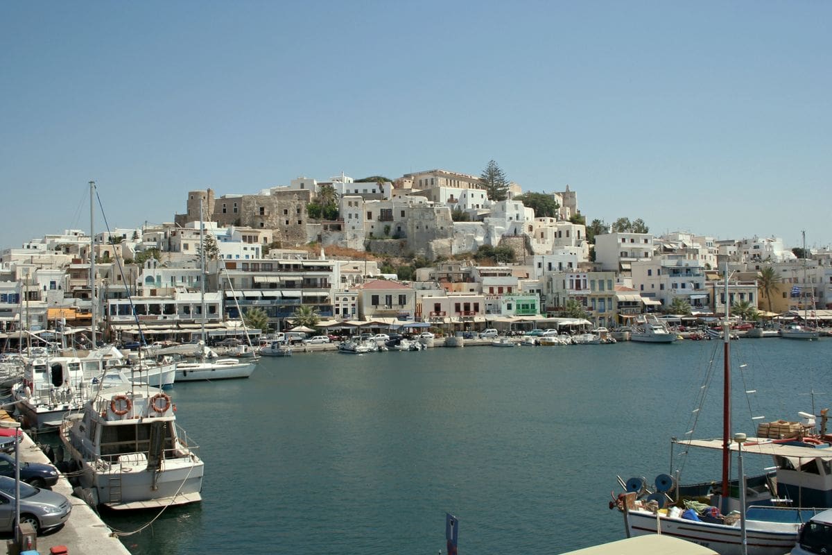Naxos Town above its harbour, the first drop-off for Naxos port transfers