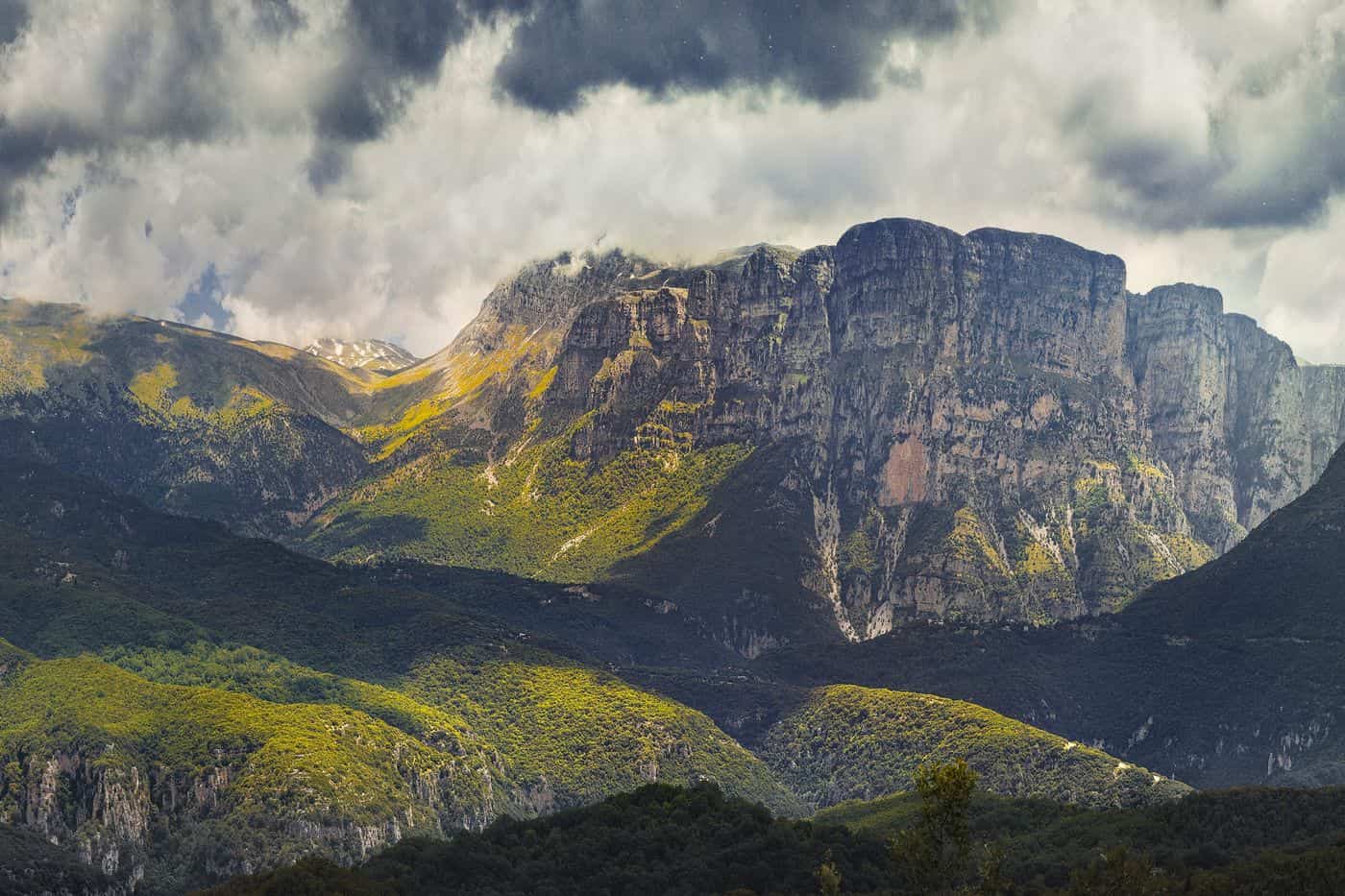 Papigo tours under the limestone Astraka towers of Mount Tymfi above Papigo in Zagori