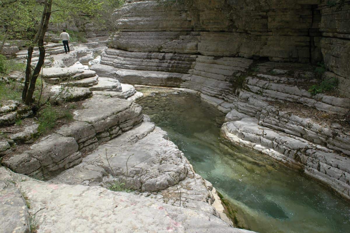 Papigo tours stop at the Ovires rock pools, the natural pools carved in the limestone near Papigo