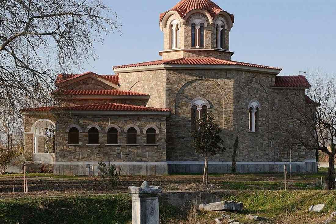 Stone church of Saint Lydia with a red tiled dome beside the baptistery site at Philippi