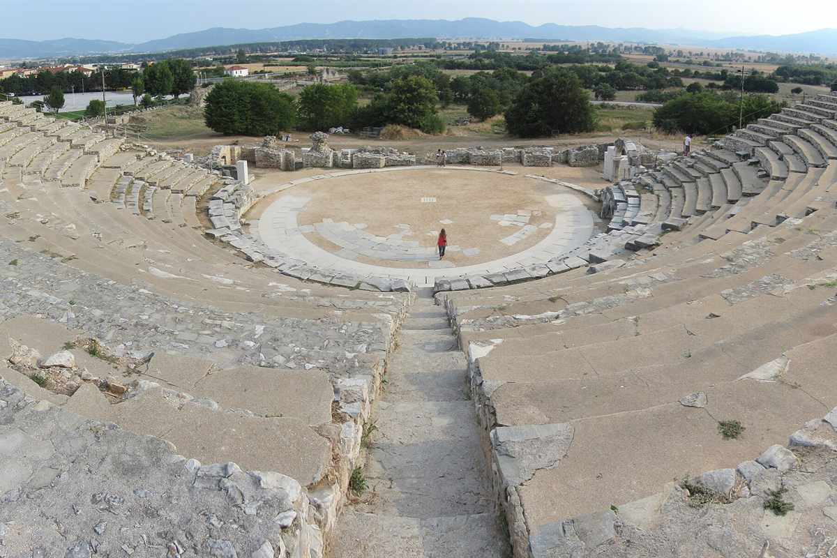 The ancient theatre of Philippi seen from its upper seats, with the plain beyond, one of the sites that Philippi tickets open