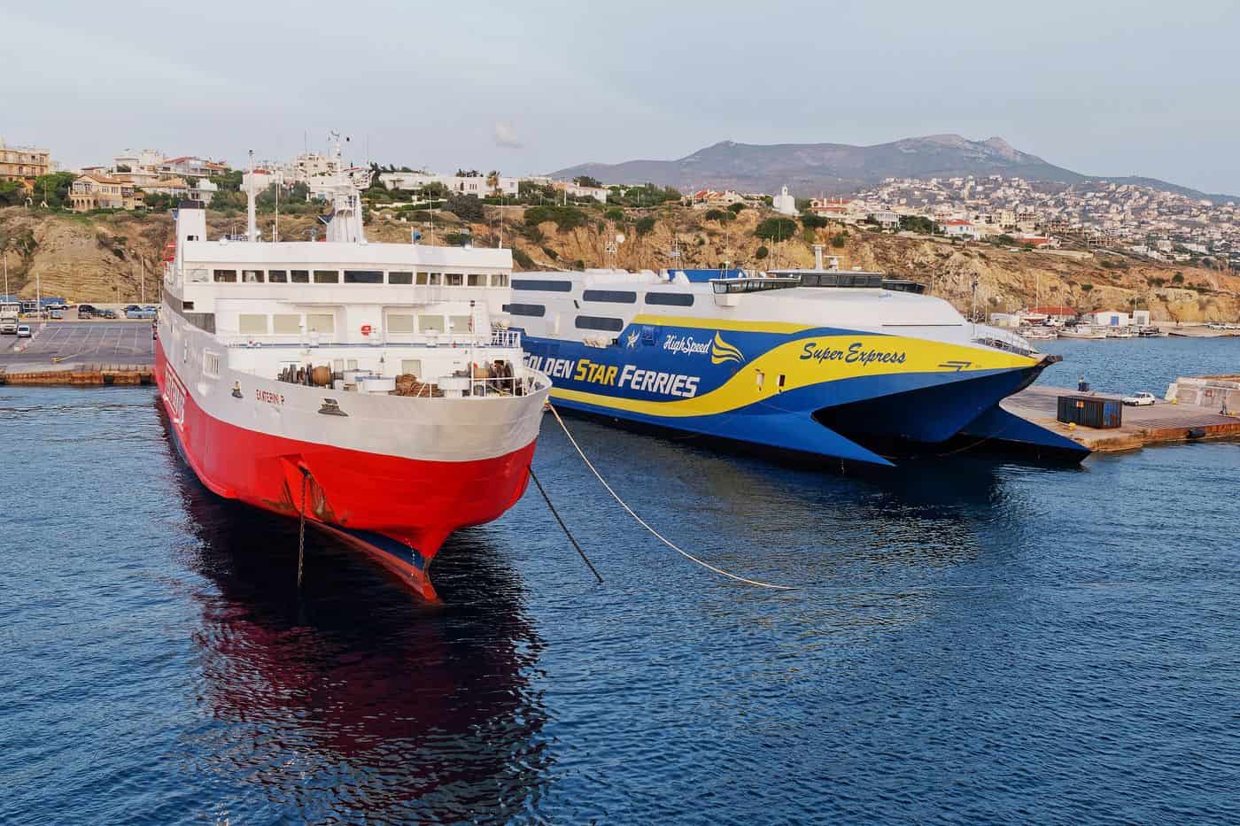 Two ferries moored in the port of Rafina, where Rafina port transfers meet island passengers