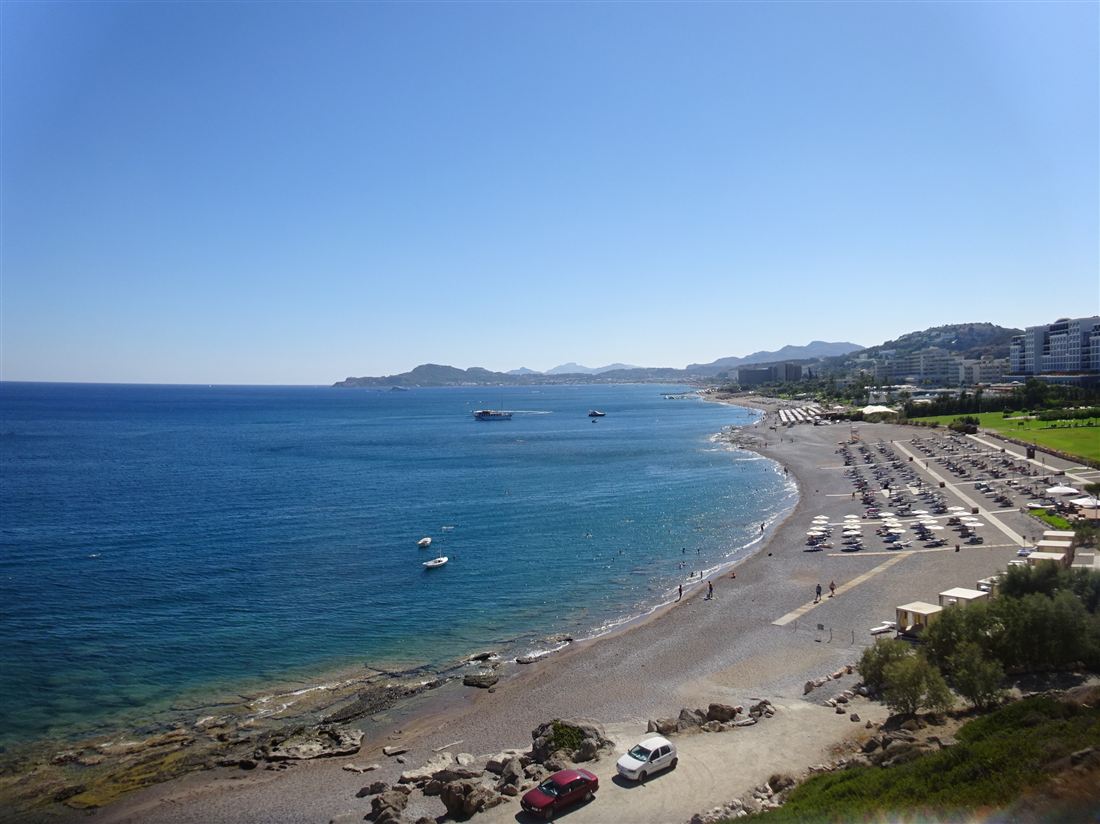 The bay of Kallithea on the east coast of Rhodes with tour boats offshore, the start of a Rhodes cave tour along the coast.