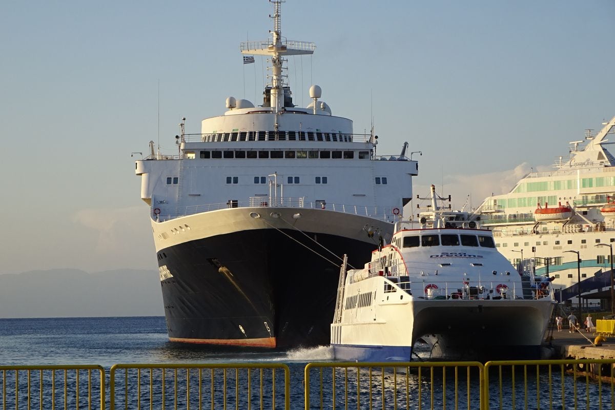 Ferries at the quay where Rhodes port transfers meet passengers