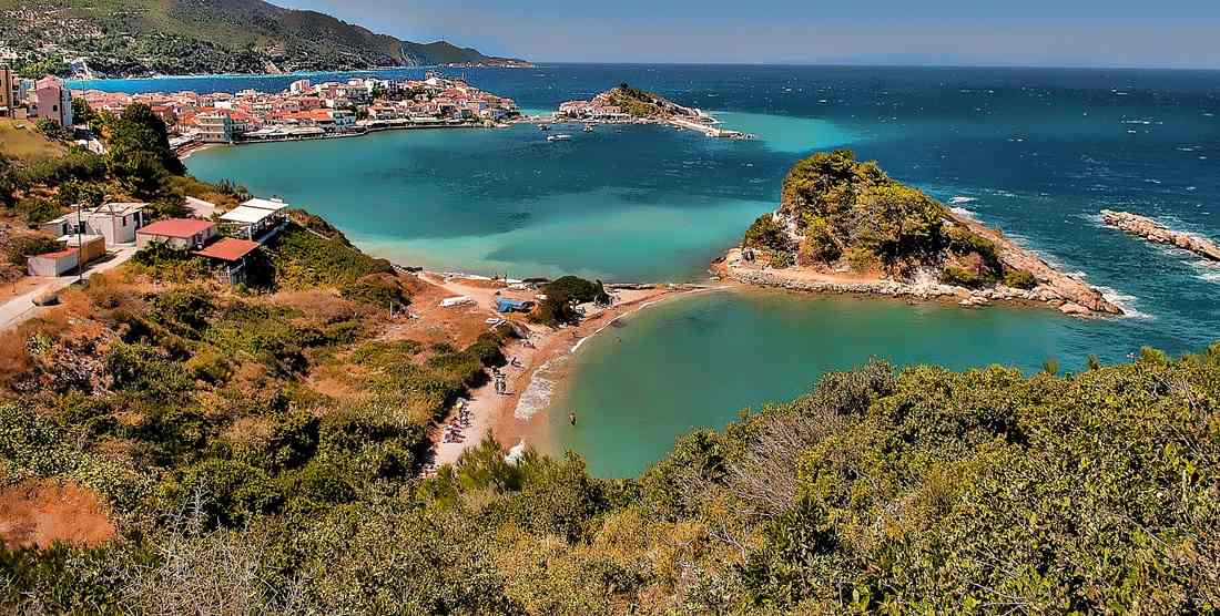 The turquoise bays and small islets beside Kokkari on the north coast of Samos, a lunch and swim stop on a Samos bus tour.