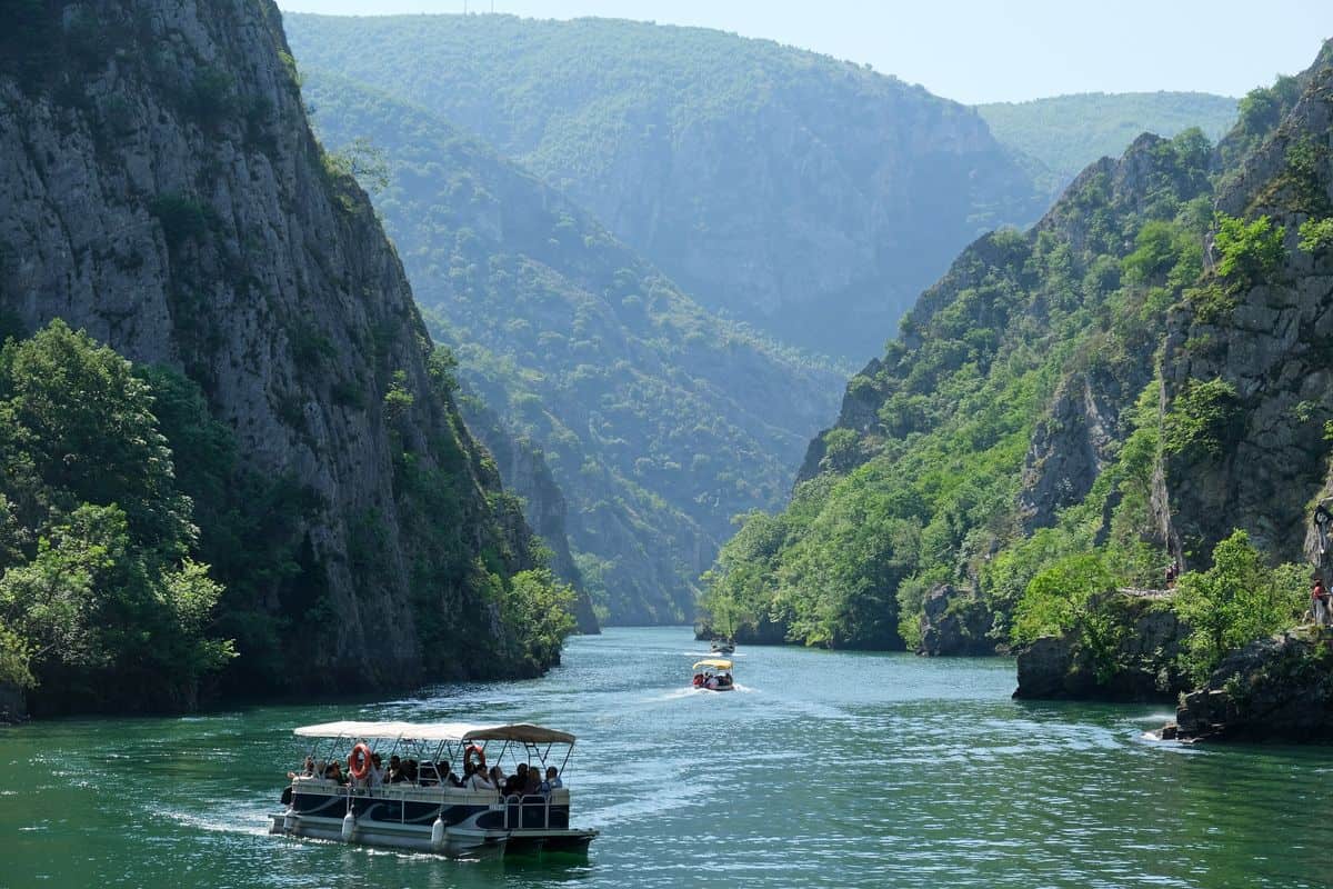 Skopje tours sail by boat on Lake Matka in Matka Canyon