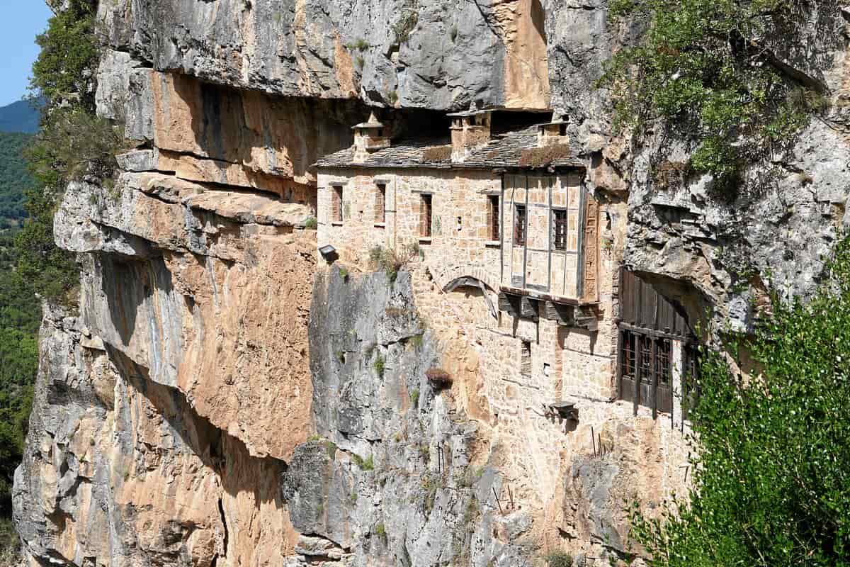 Tzoumerka tours visit the Kipina Monastery built into a cliff near Kalarrytes
