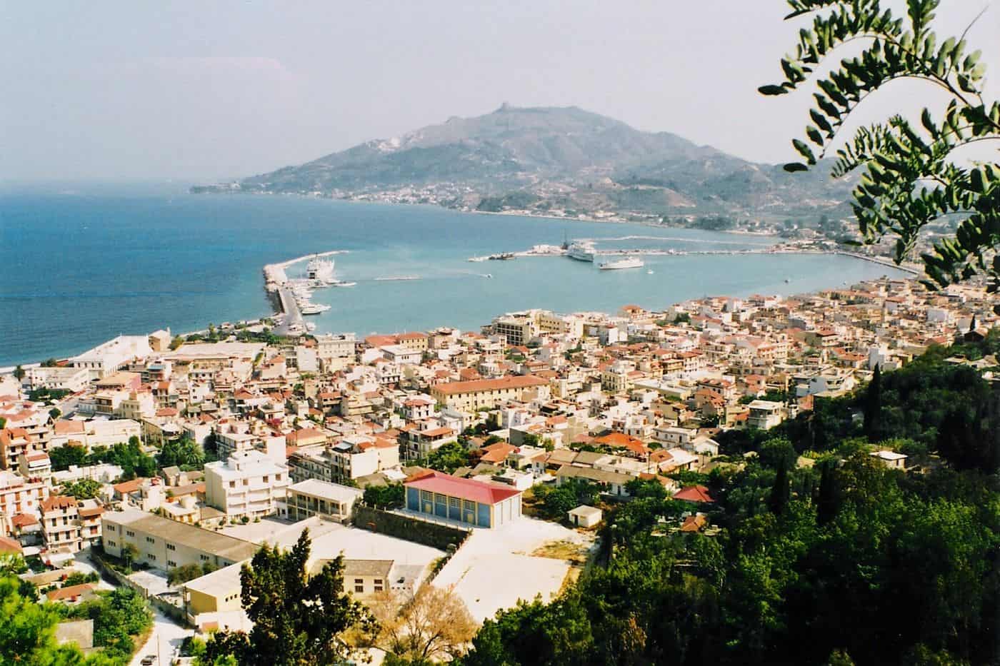 Zakynthos town and the harbour breakwater from above, where Zakynthos port transfers start